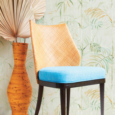 Bamboo Gardens Non-Pasted Wallpaper - A blue and orange chair in front of Bamboo Gardens Unpasted Wallpaper in sage | Tempaper#color_sage