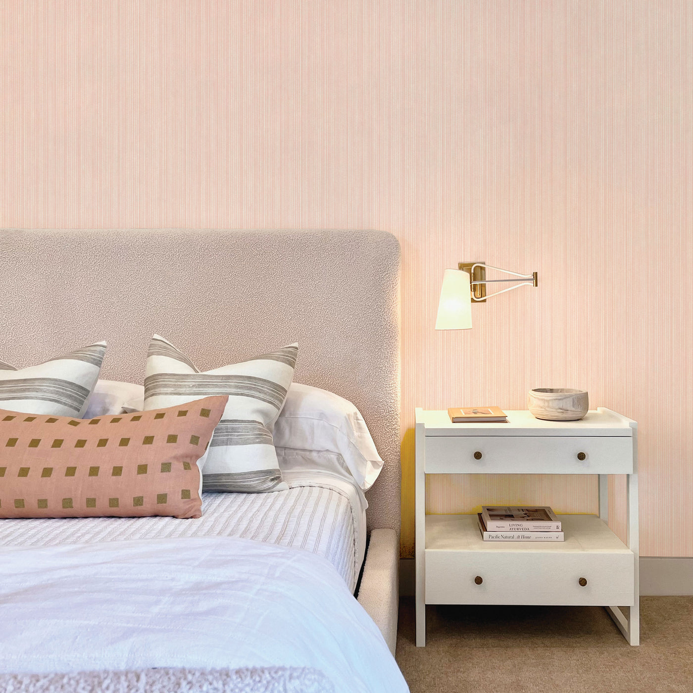 Faux Grasscloth Removable Wallpaper - A bedroom with a pink bed and white nightstand featuring Faux Grasscloth Peel And Stick Wallpaper in textured blush | Tempaper#color_textured-blush