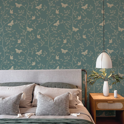Monarch Non-Pasted Wallpaper - A bedroom with a bed and wood nightstand featuring Monarch Unpasted Wallpaper in spruce | Tempaper#color_spruce