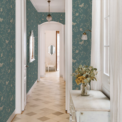 Monarch Non-Pasted Wallpaper - A hallway with a white dresser and plant featuring Monarch Unpasted Wallpaper in spruce | Tempaper#color_spruce