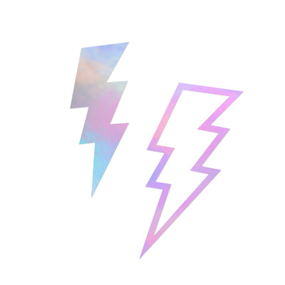 Two lightning bolts, a white one outlined with pink and purple and another colored with holographic blues and pinks.