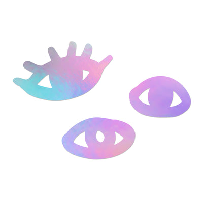 Image of pink and purple metallic eye wall decals, both with and without eyelashes.