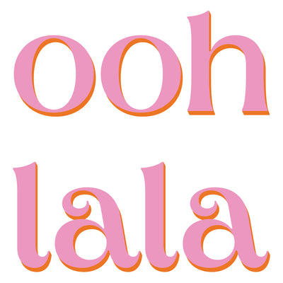 The words "ooh la la" written in pink and outlined in orange, from the Ooh La La wall decal set at Tempaper.