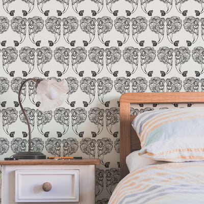 Block Print Mermaids Removable Wallpaper - A bedroom featuring Tempaper's Block Print Mermaids Peel And Stick Wallpaper in onyx muse | Tempaper#color_onyx-muse