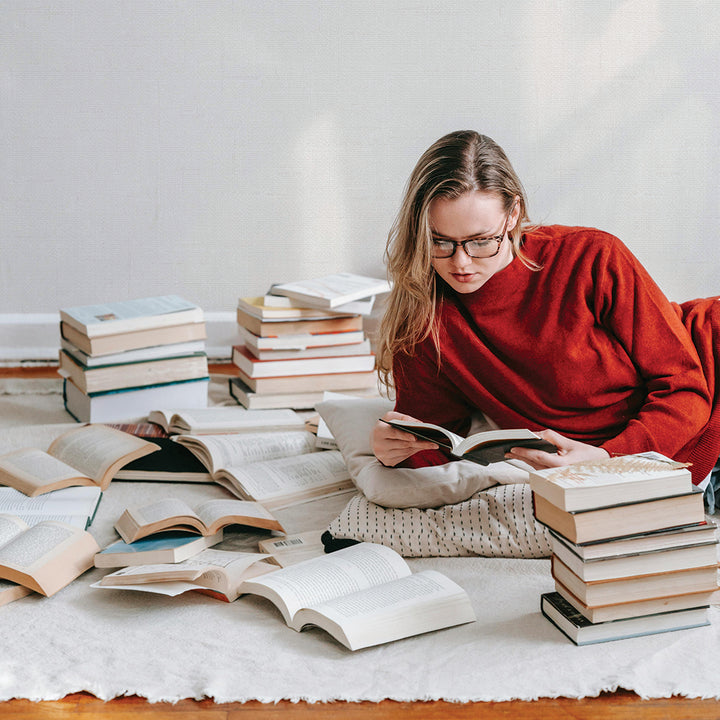 Burlap Removable Wallpaper - A  college student reading a book in a room featuring Burlap Peel And Stick Wallpaper in ocean mist faux burlap | Tempaper #color_ocean-mist-burlap