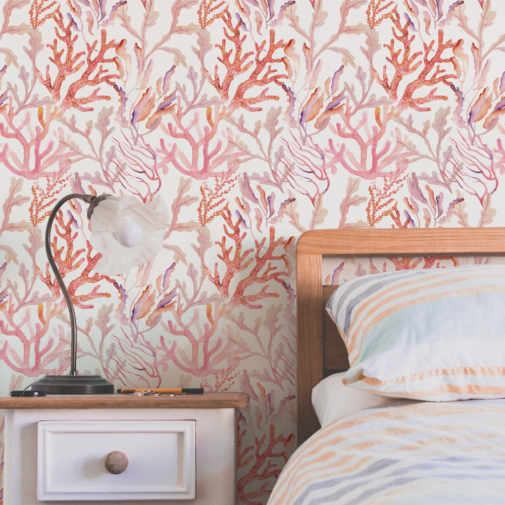 Coral Reef Removable Wallpaper - A bedroom featuring Tempaper's Coral Reef Peel And Stick Wallpaper in rose quartz | Tempaper