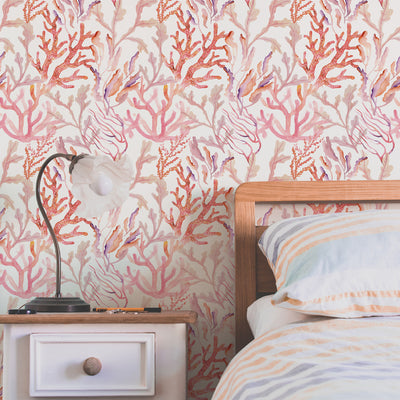 Coral Reef Removable Wallpaper - A bedroom featuring Tempaper's Coral Reef Peel And Stick Wallpaper in rose quartz | Tempaper