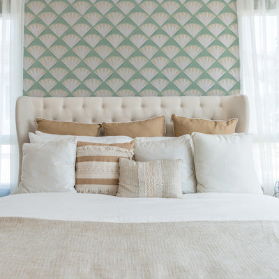 Deco Shell Removable Wallpaper - A bedroom featuring Tempaper's Deco Shell Peel And Stick Wallpaper in fresh mint | Tempaper