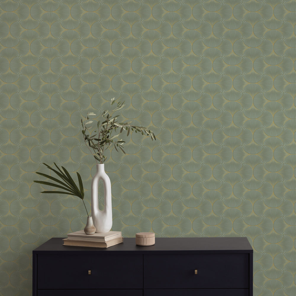 Gilded Scallop Non-Pasted Wallpaper - A black dresser and plants with Gilded Scallop Unpasted Wallpaper in green agate | Tempaper#color_green-agate