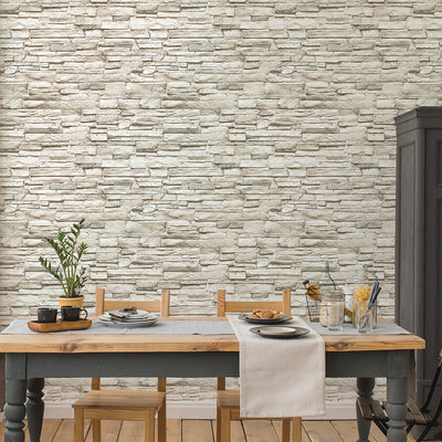 Light Stone Removable Wallpaper - A wood table with three chairs in a dining room featuring Tempaper's Light Stone Peel And Stick Wallpaper | Tempaper