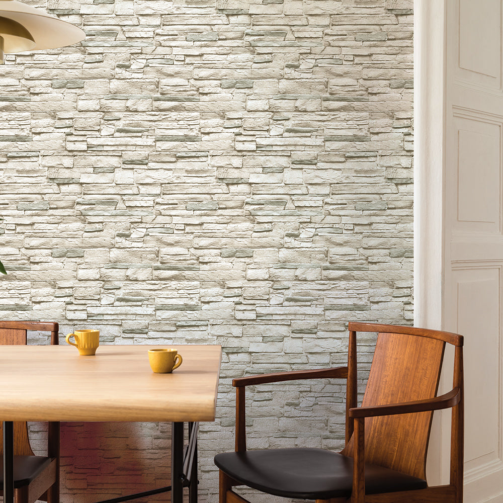Light Stone Removable Wallpaper - A wood table and two wood chairs in a room featuring Tempaper's Light Stone Peel And Stick Wallpaper | Tempaper