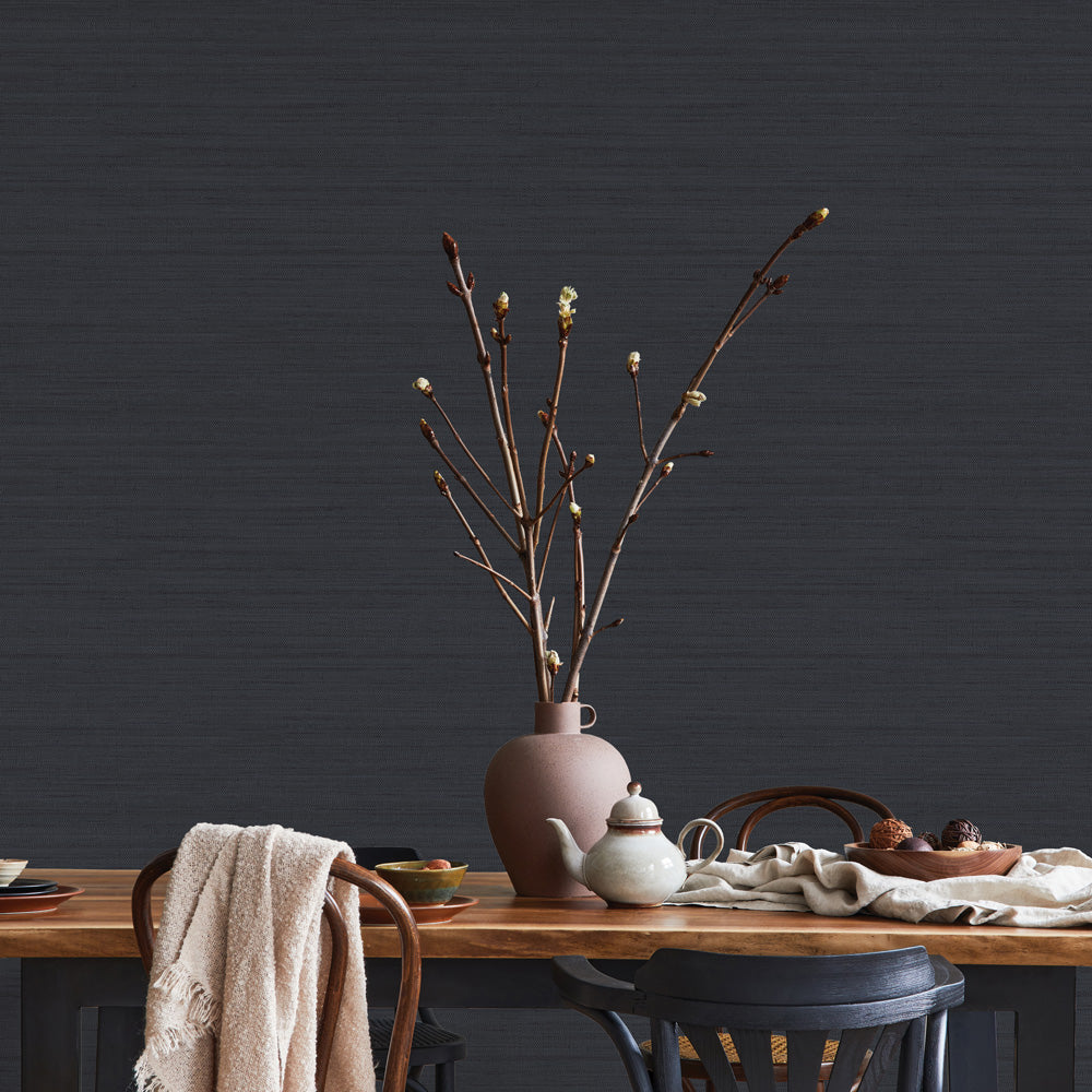 Faux Horizontal Grasscloth Removable Wallpaper - A dining room with a wood table and chairs featuring Faux Horizontal Grasscloth Peel And Stick Wallpaper in textured navy | Tempaper#color_textured-navy