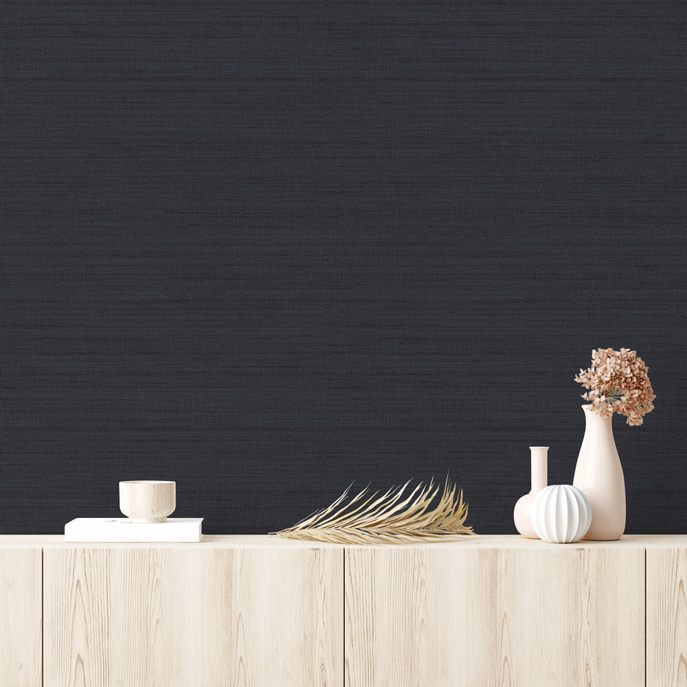 Faux Horizontal Grasscloth Removable Wallpaper - A wood dresser with beige vases and a wall featuring Faux Horizontal Grasscloth Peel And Stick Wallpaper in textured navy | Tempaper#color_textured-navy