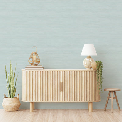 Faux Horizontal Grasscloth Removable Wallpaper - A wood dresser in a room featuring Faux Horizontal Grasscloth Peel And Stick Wallpaper in textured seaglass | Tempaper#color_textured-seaglass