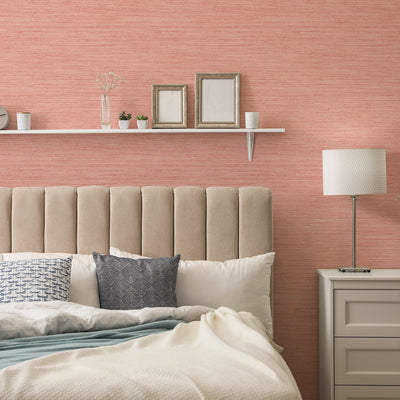 Faux Horizontal Grasscloth Removable Wallpaper - A bedroom with a bed and white nightstand featuring Faux Horizontal Grasscloth Peel And Stick Wallpaper in textured salmon | Tempaper#color_textured-salmon