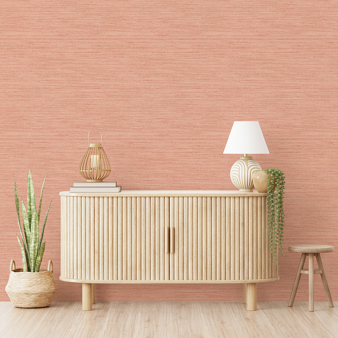 Faux Horizontal Grasscloth Removable Wallpaper - A wood dresser in a room featuring Faux Horizontal Grasscloth Peel And Stick Wallpaper in textured salmon | Tempaper#color_textured-salmon