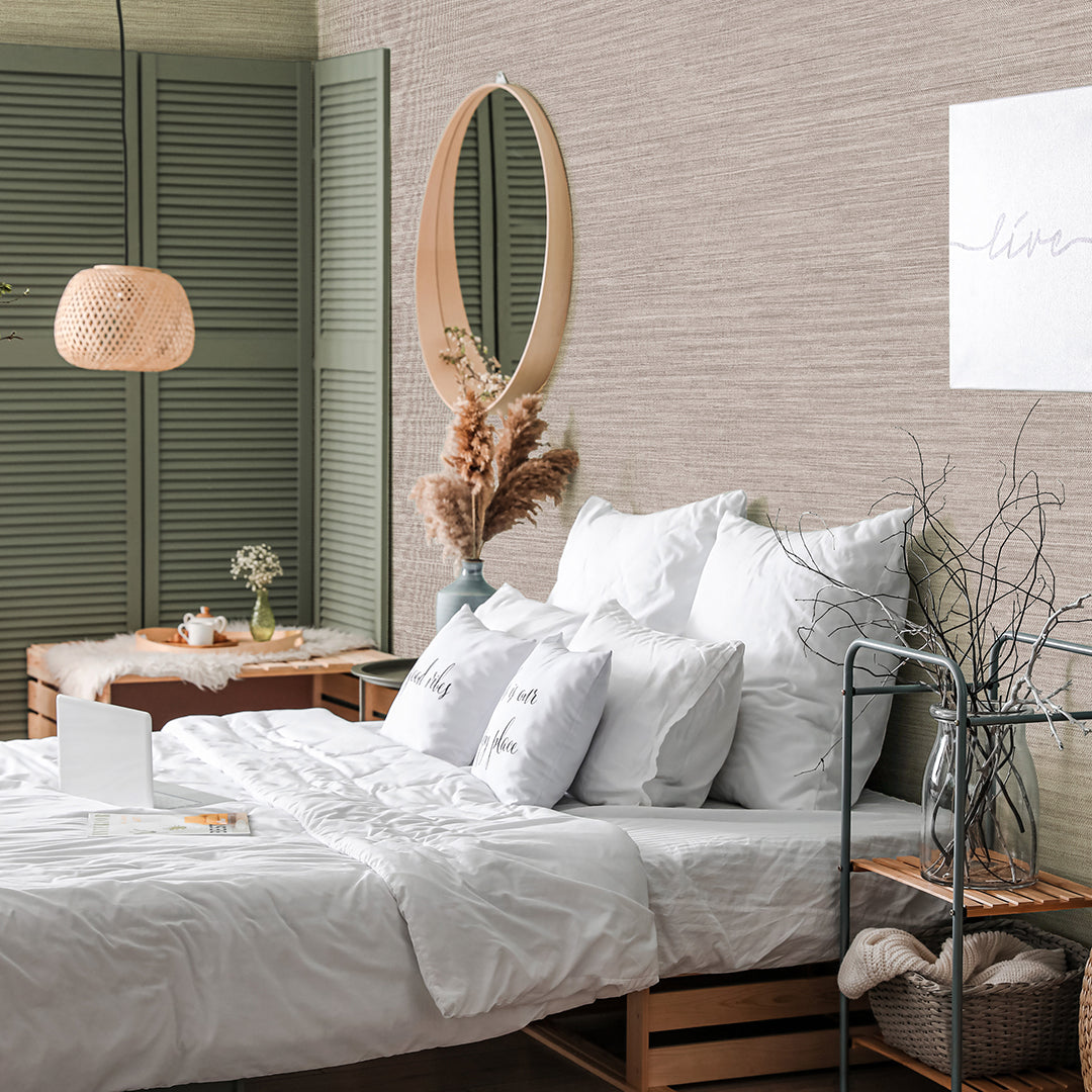 Faux Horizontal Grasscloth Removable Wallpaper - A bedroom with a bed and wood furniture featuring Faux Horizontal Grasscloth Peel And Stick Wallpaper in textured pewter | Tempaper#color_textured-pewter