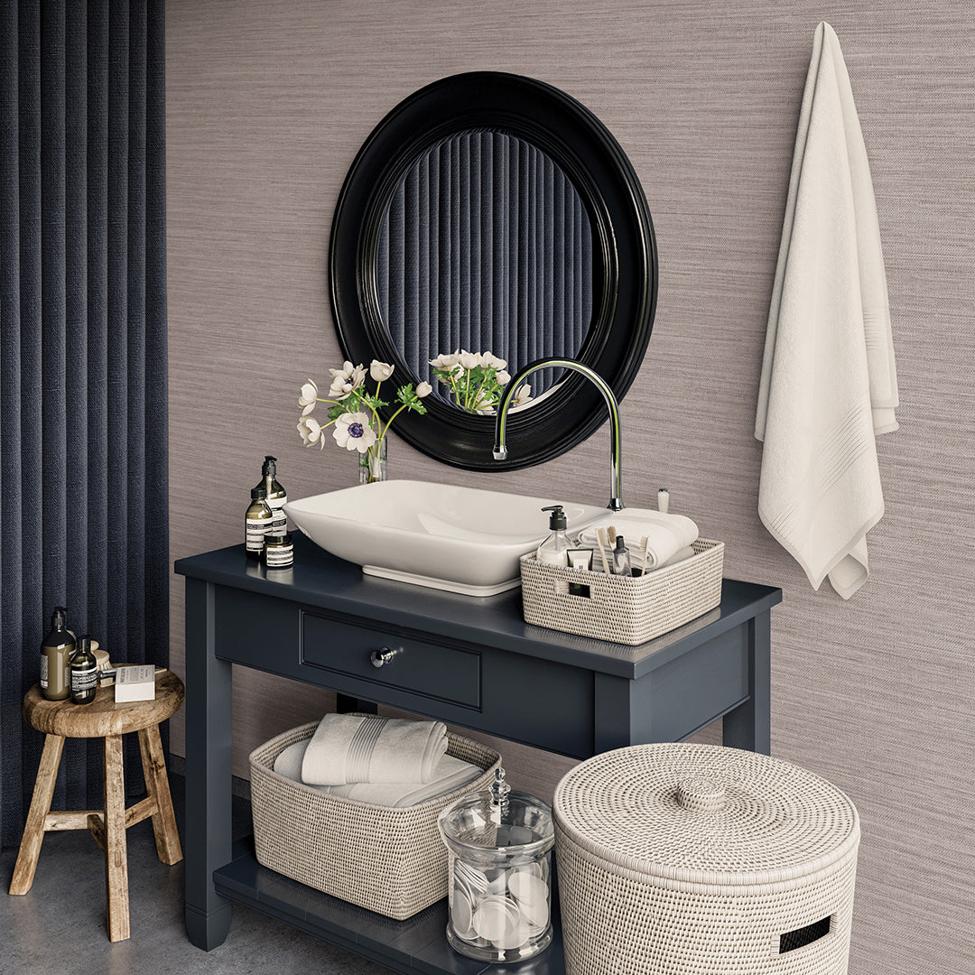 Faux Horizontal Grasscloth Removable Wallpaper - A bathroom with a dark gray vanity and white sink underneath a black mirror, featuring Faux Horizontal Grasscloth Peel And Stick Wallpaper in textured pewter | Tempaper#color_textured-pewter