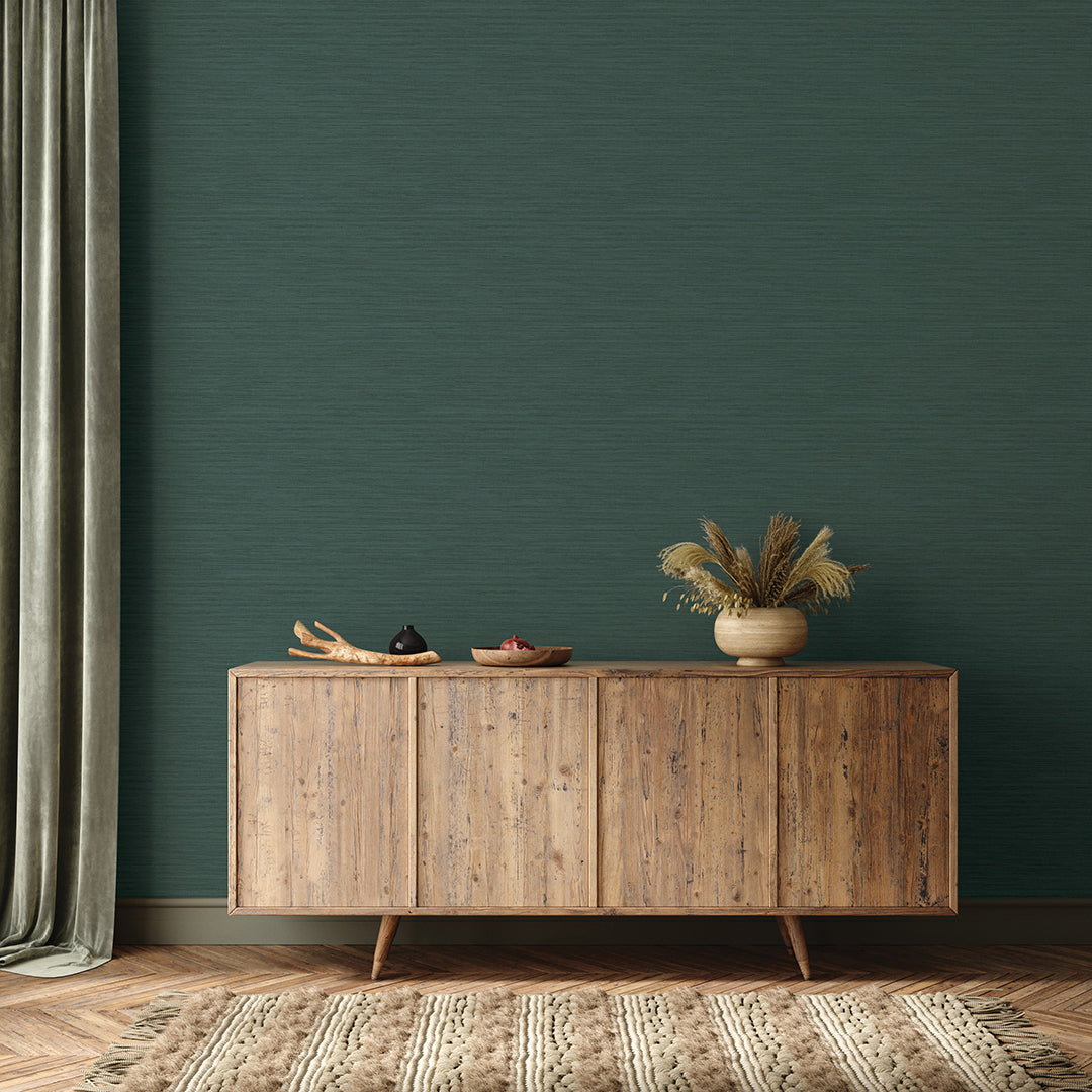Faux Horizontal Grasscloth Removable Wallpaper - A wood sideboard and a rug in a room featuring Faux Horizontal Grasscloth Peel And Stick Wallpaper in textured mediterranean teal | Tempaper#color_textured-mediterranean-teal