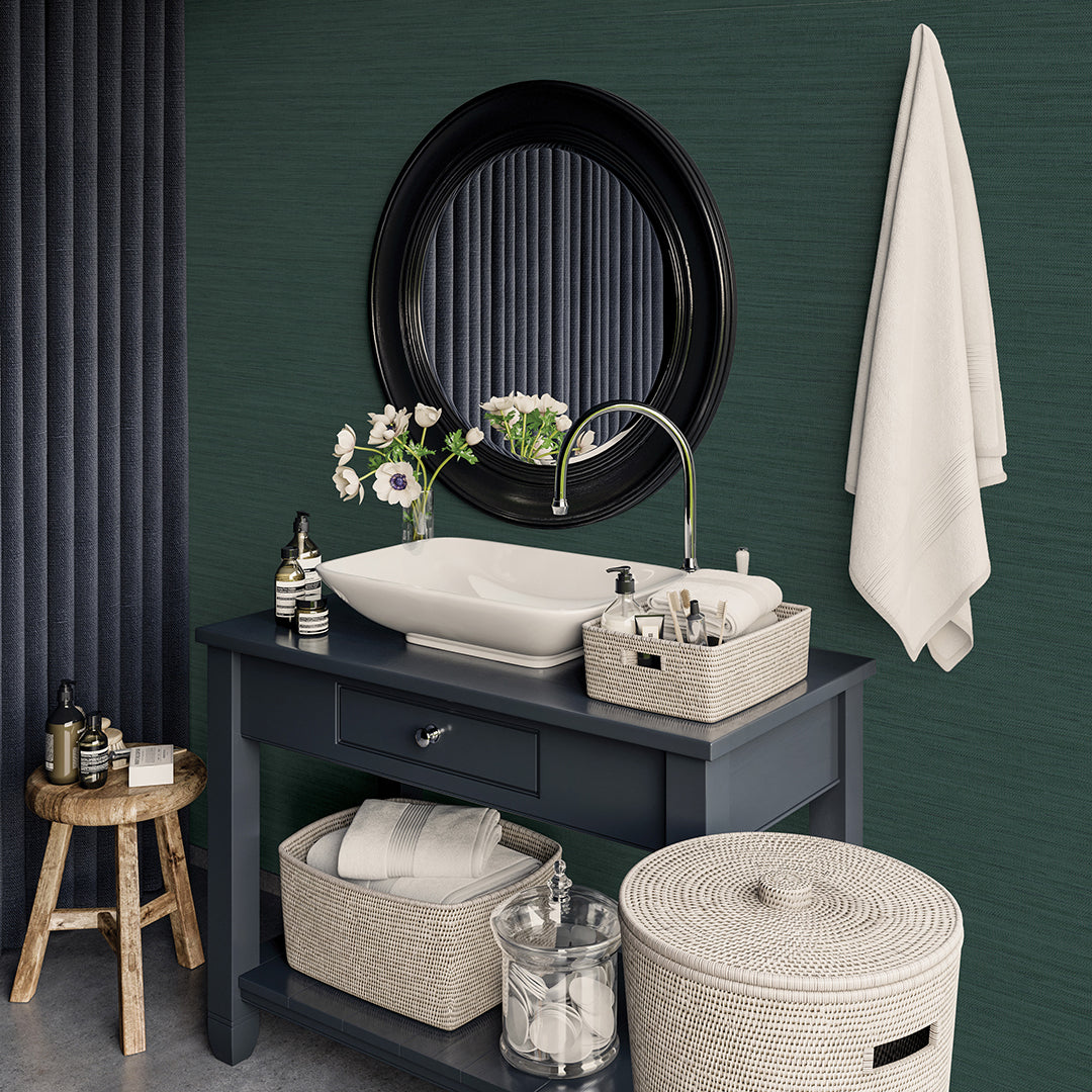 Faux Horizontal Grasscloth Removable Wallpaper - A bathroom with a dark gray vanity and white sink underneath a black mirror, featuring Faux Horizontal Grasscloth Peel And Stick Wallpaper in textured mediterranean teal | Tempaper#color_textured-mediterranean-teal