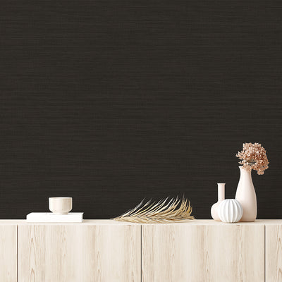 Faux Horizontal Grasscloth Removable Wallpaper - A wood dresser with beige vases and a wall featuring Faux Horizontal Grasscloth Peel And Stick Wallpaper in textured black raven | Tempaper#color_textured-black-raven