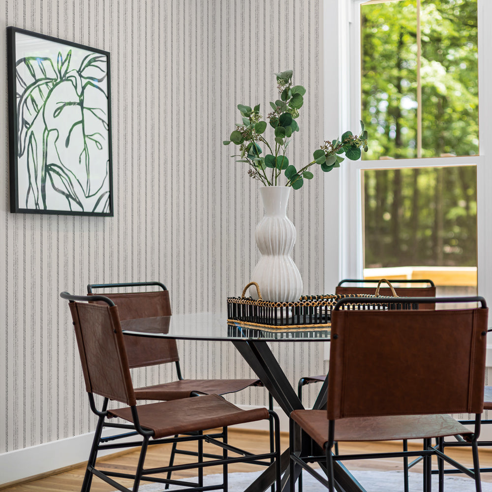 Nautical Stripe Removable Wallpaper - Four brown chairs and a table in a room featuring Tempaper's Nautical Stripe Peel And Stick Wallpaper | Tempaper#color_charcoal-and-cotton