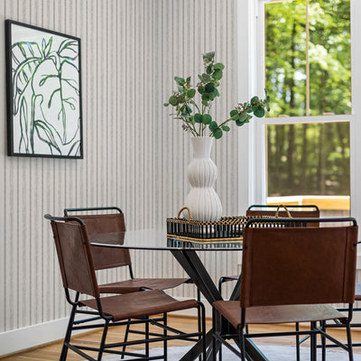 Nautical Stripe Removable Wallpaper - Four brown chairs and a table in a room featuring Tempaper's Nautical Stripe Peel And Stick Wallpaper | Tempaper#color_charcoal-and-cotton