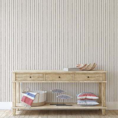 Nautical Stripe Removable Wallpaper - A wood desk in front of a wall featuring Tempaper's Nautical Stripe Peel And Stick Wallpaper | Tempaper#color_charcoal-and-cotton