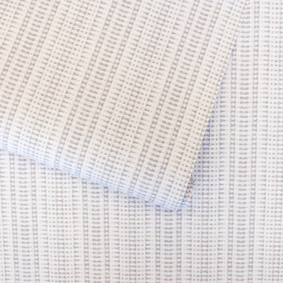 Batik Stripe Removable Wallpaper - A roll of Batik Stripe Peel And Stick Wallpaper in french grey | Tempaper#color_french-grey