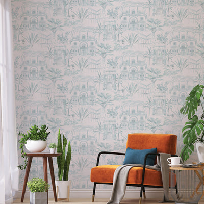 Boulevard Toile Non-Pasted Wallpaper - An orange chair and plants with Boulevard Toile Unpasted Wallpaper in coastal green toile | Tempaper#color_coastal-green-toile