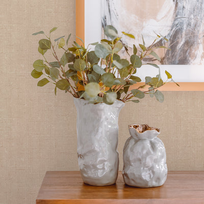 Burlap Removable Wallpaper - Two vases on a wood table in front of a wall featuring Burlap Peel And Stick Wallpaper in natural burlap | Tempaper#color_natural-burlap
