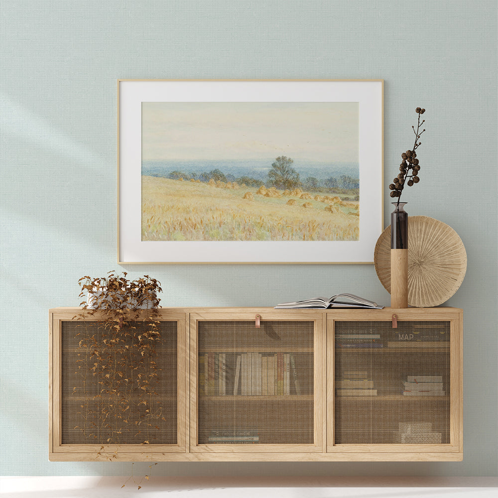 Burlap Removable Wallpaper - A wood sideboard with books and a picture frame in a room featuring Burlap Peel And Stick Wallpaper in ocean mist burlap | Tempaper#color_ocean-mist-burlap