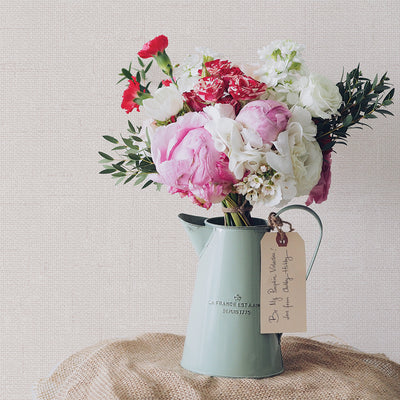 Burlap Removable Wallpaper - A blue vase with flowers in a room featuring Burlap Peel And Stick Wallpaper in linen burlap | Tempaper#color_linen-burlap