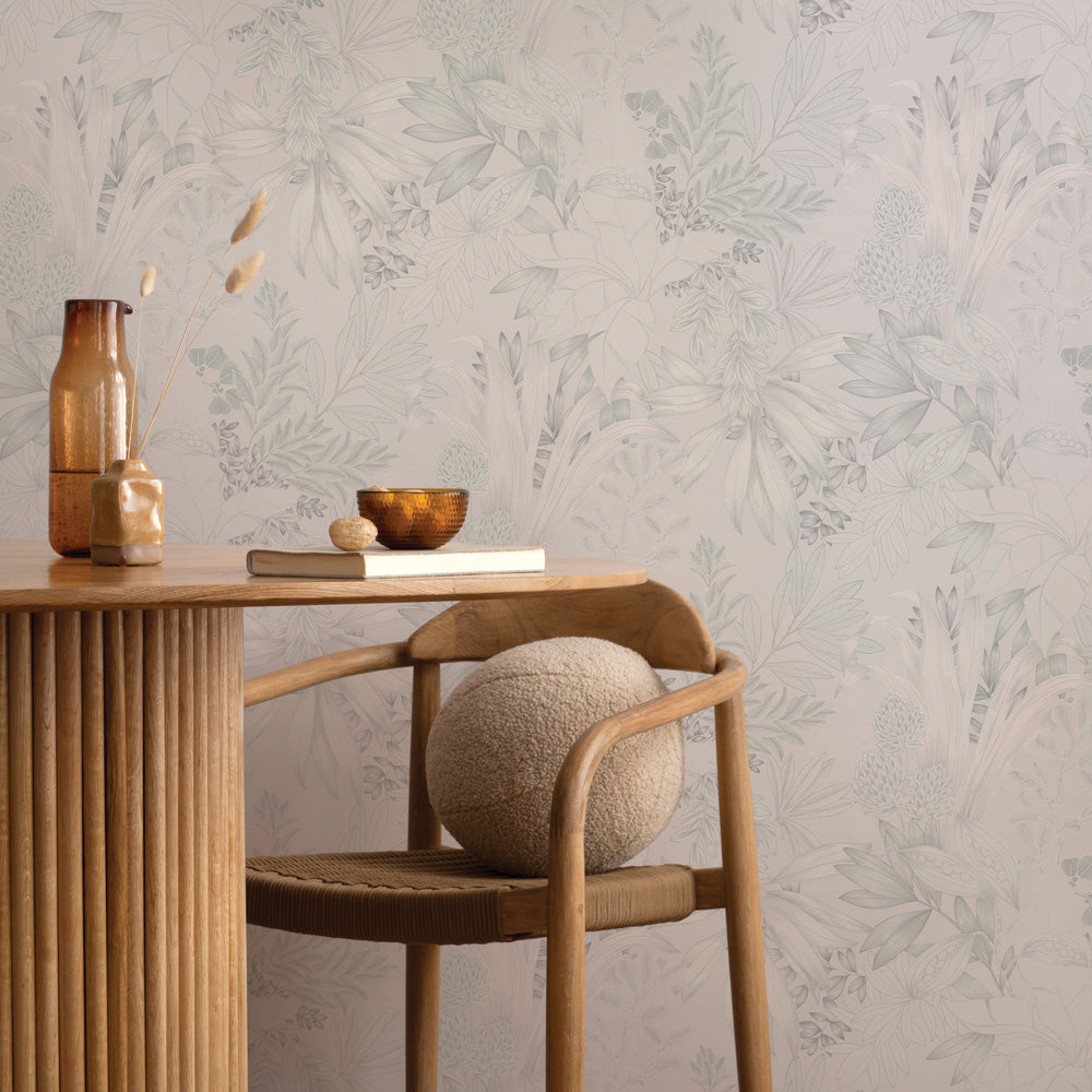 Coniferous Floral Unpasted Wallpaper - The silk  colorway of Coniferous Floral Non-Pasted Wallpaper behind a wood chair and table | Tempaper#color_silk