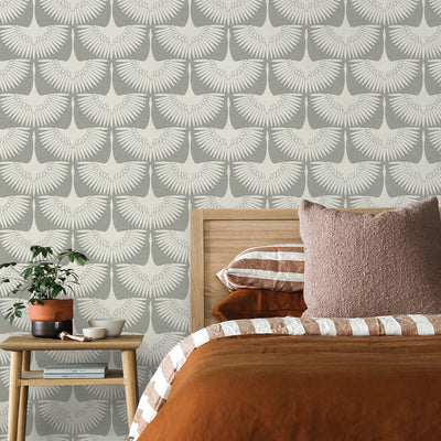 Feather Flock Removable Wallpaper - A bed with a wood headboard and a wood nightstand in a bedroom featuring Tempaper's Feather Flock Peel And Stick Wallpaper in chalk scallops#color_chalk-scallops