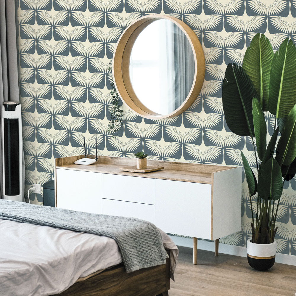 Feather Flock Removable Wallpaper - A white sideboard, plant, mirror, and bed in a bedroom featuring Tempaper's Feather Flock Peel And Stick Wallpaper in denim blue scallops#color_denim-blue-scallops