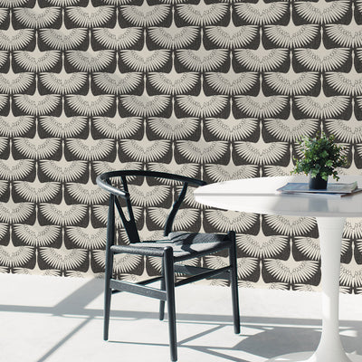Feather Flock Removable Wallpaper - A white table and black chair in front of a wall featuring Tempaper's Feather Flock Peel And Stick Wallpaper in storm grey scallops#color_storm-grey-scallops