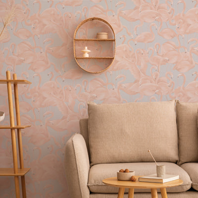 Pastel Flamingo Wallpaper paired with a neutral couch and wooden table #color_pastel-pink-and-blue