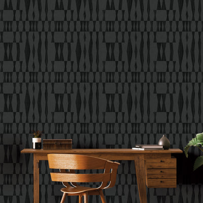 Faux Grasscloth Geo Removable Wallpaper - A wood desk and chair in front of a wall featuring Faux Grasscloth Geo Peel And Stick Wallpaper in textured carbon | Tempaper#color_textured-carbon
