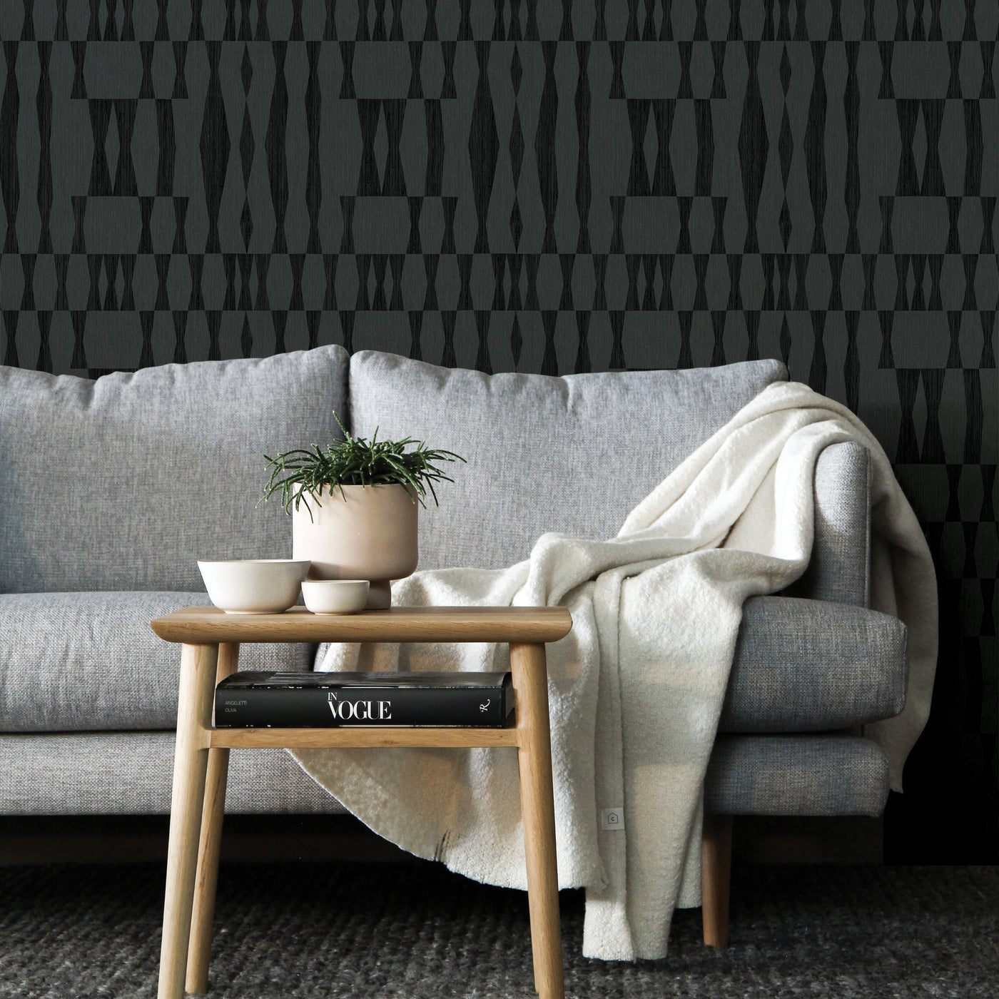Faux Grasscloth Geo Removable Wallpaper - A grey couch and wood coffee table in a room featuring Faux Grasscloth Peel And Stick Wallpaper in textured carbon | Tempaper#color_textured-carbon