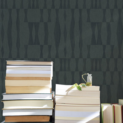 Faux Grasscloth Geo Removable Wallpaper - Several books in front of a wall featuring Faux Grasscloth Peel And Stick Wallpaper in textured seagrass | Tempaper#color_textured-seagrass