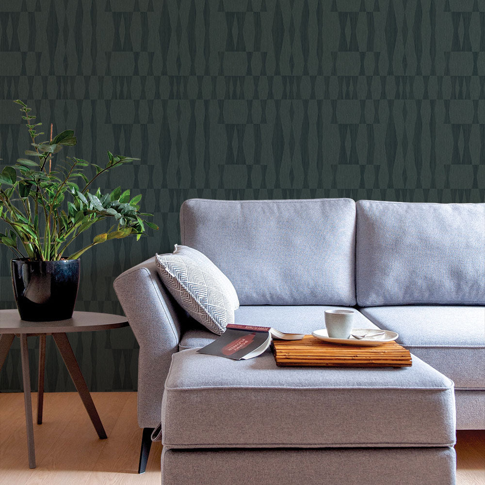 Faux Grasscloth Geo Removable Wallpaper - A grey couch and a table with a plant in a room featuring Faux Grasscloth Peel And Stick Wallpaper in textured seagrass | Tempaper#color_textured-seagrass
