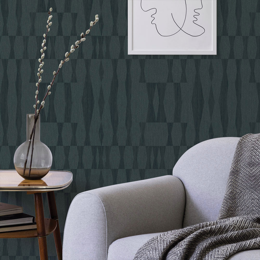 Faux Grasscloth Geo Removable Wallpaper - A grey couch and a table with a plant in a room featuring Faux Grasscloth Peel And Stick Wallpaper in textured seagrass | Tempaper#color_textured-seagrass