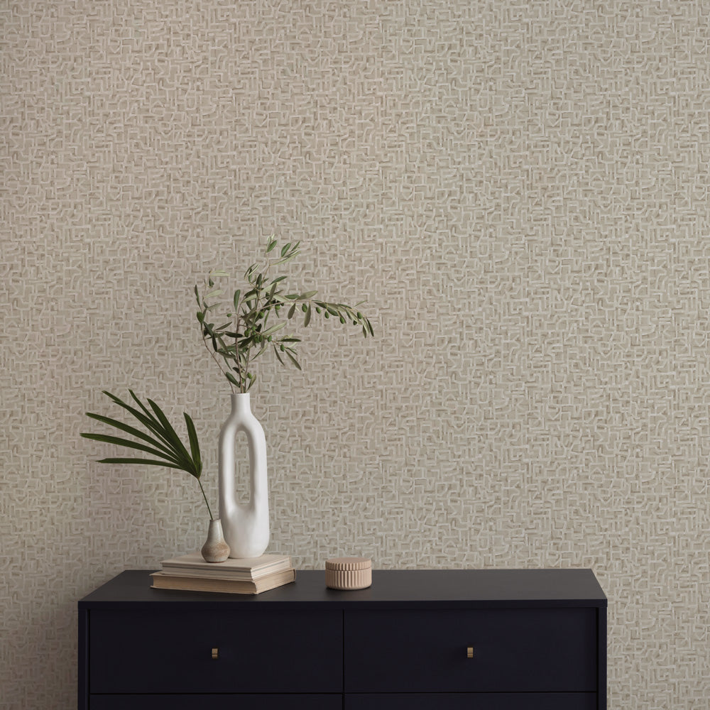 Glyph Geo Non-Pasted Wallpaper - A black dresser with plants in white vases in front of Glyph Geo Unpasted Wallpaper in fawn geo | Tempaper#color_fawn-geo