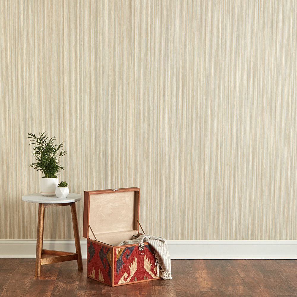 Faux Grasscloth Removable Wallpaper - An end table and chest in a room featuring Faux Grasscloth Peel And Stick Wallpaper in textured sand | Tempaper#color_textured-sand