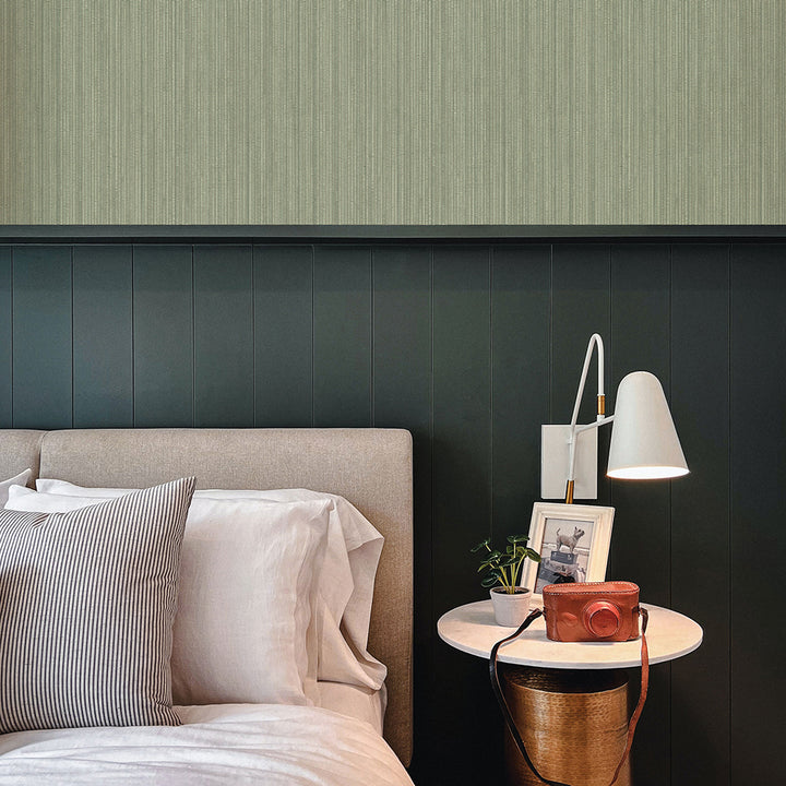 Faux Grasscloth Removable Wallpaper - A bed and nightstand in a bedroom featuring Faux Grasscloth Peel And Stick Wallpaper in textured sage | Tempaper#color_textured-sage