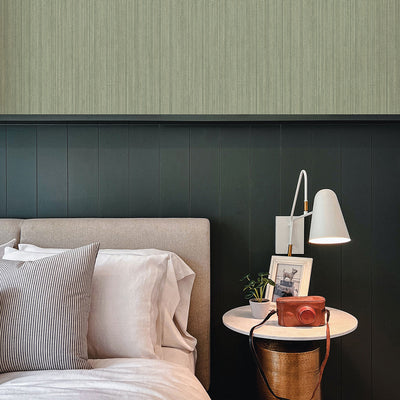 Faux Grasscloth Removable Wallpaper - A bed and nightstand in a bedroom featuring Faux Grasscloth Peel And Stick Wallpaper in textured sage | Tempaper#color_textured-sage