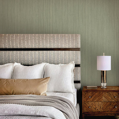 Faux Grasscloth Removable Wallpaper - A bedroom with a bed and wood nightstand featuring Faux Grasscloth Peel And Stick Wallpaper in textured sage | Tempaper#color_textured-sage