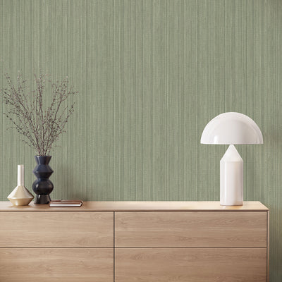 Faux Grasscloth Removable Wallpaper - A wood sideboard with a white lamp in a room featuring Faux Grasscloth Peel And Stick Wallpaper in textured sage | Tempaper#color_textured-sage