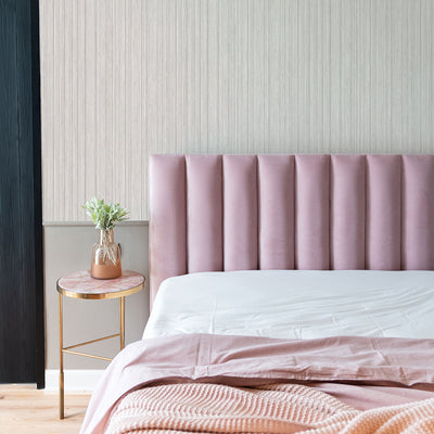 Faux Grasscloth Removable Wallpaper - A bedroom with a pink bed and gold nightstand featuring Faux Grasscloth Peel And Stick Wallpaper in textured sterling silver | Tempaper#color_textured-sterling-silver